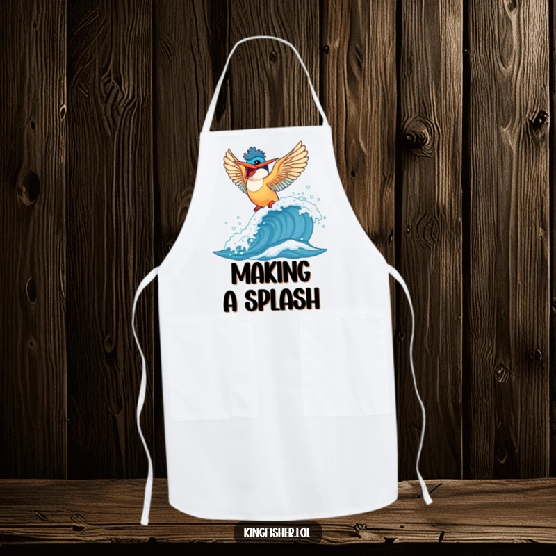 Funny Kingfisher Apron: Chef bird enthusiastically flaps wings while riding a wave, a fun kitchen essential.