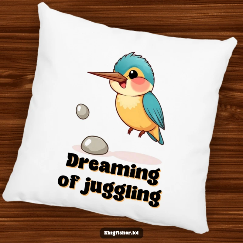 Funny pillow featuring a smiling kingfisher bird awkwardly juggling shiny pebbles, offering comfort and a touch of playful charm.