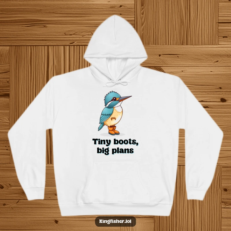Funny kingfisher wearing small boots, enthusiastically tapping its foot on a cozy hoodie, a whimsical and humorous character.