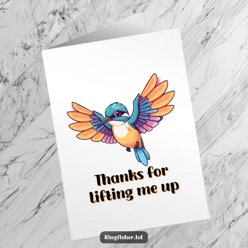 Free printable thank you card: A kawaii kingfisher bird in mid-flight, wings wide, trailing colorful feathers, conveying heartfelt thanks.