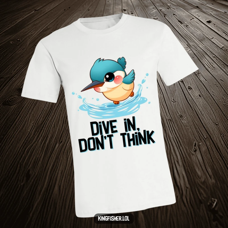Funny Kingfisher T-Shirt: A tiny, cute kingfisher with big eyes is captured mid-dive into sparkling blue water, a humorous depiction.