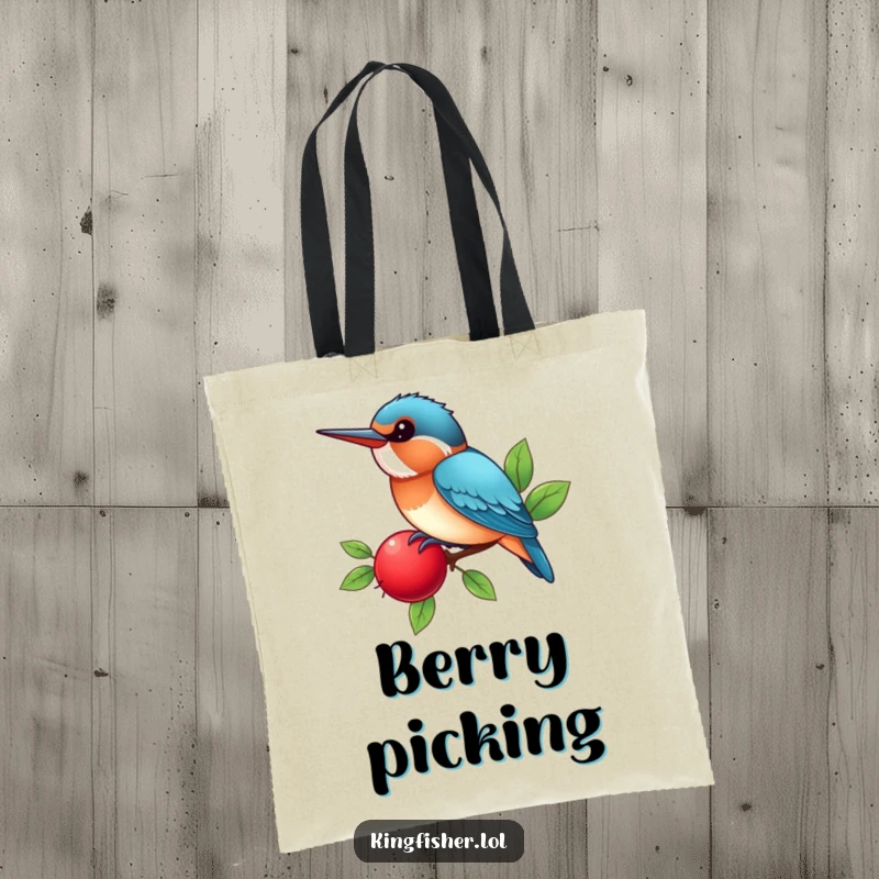 Funny Kingfisher Tote Bag with a kawaii bird happily perched on a bright red berry, chirping, a humorous and stylish accessory.