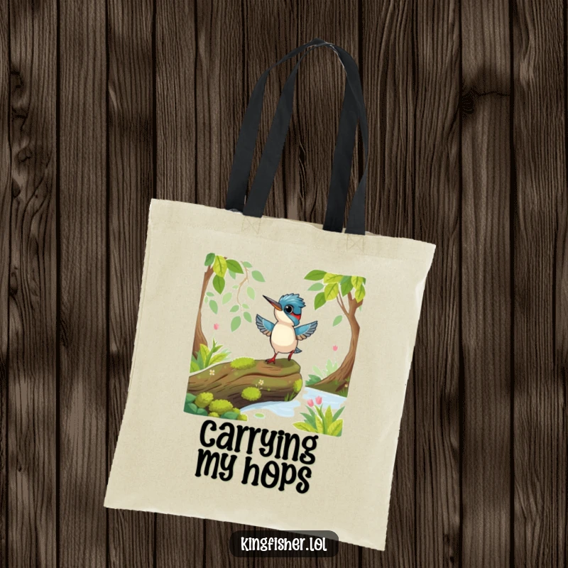 Funny Playful Kingfisher Tote Bag: A playful kingfisher bird hopping excitedly on a mossy log.