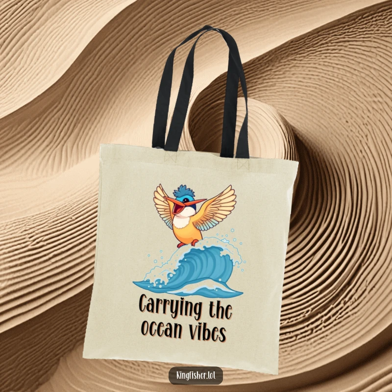 Funny Kingfisher Tote Bag: A vibrant bird joyfully surfs a breaking wave, perfect for beach days.